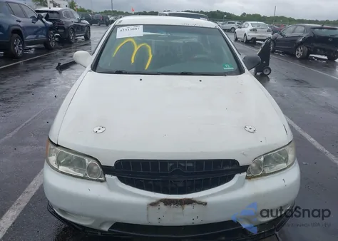 2001 Nissan Altima Gxe z USA, uszkodzony, nr VIN 1N4DL01D01C117464